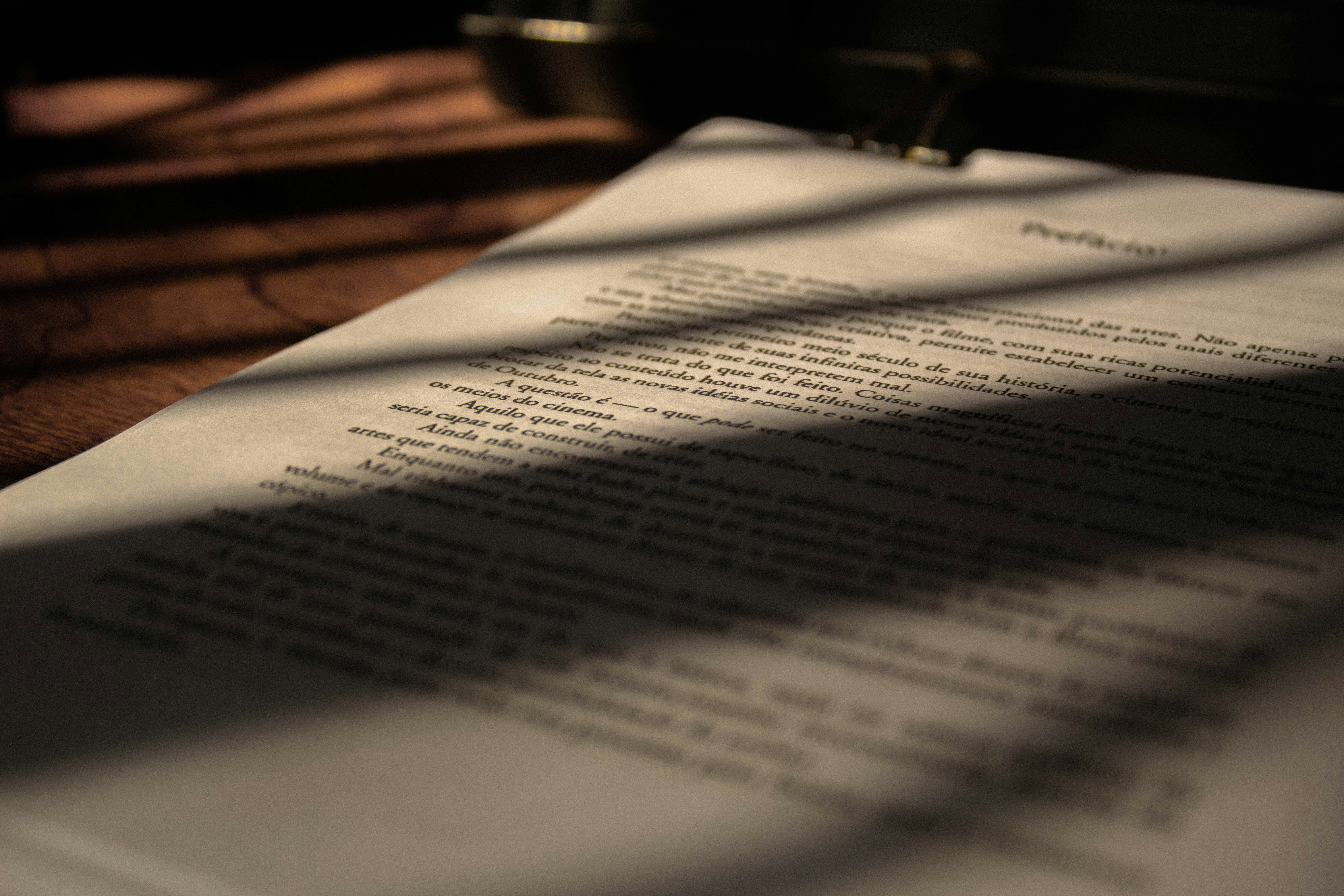 Close-up of a contract page under soft shadows.