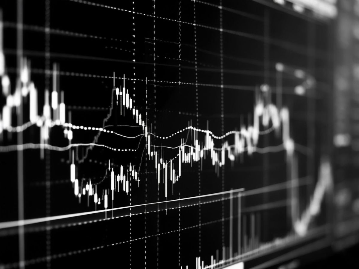 Close-up of fluctuating financial chart on a screen, symbolizing contract performance data