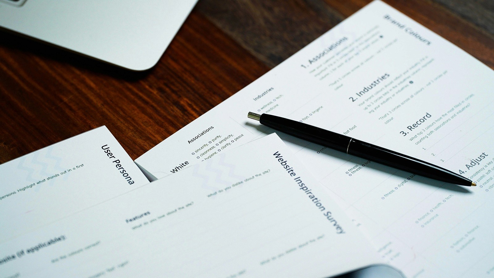 Internship paperwork and forms prepared for review on a workspace.