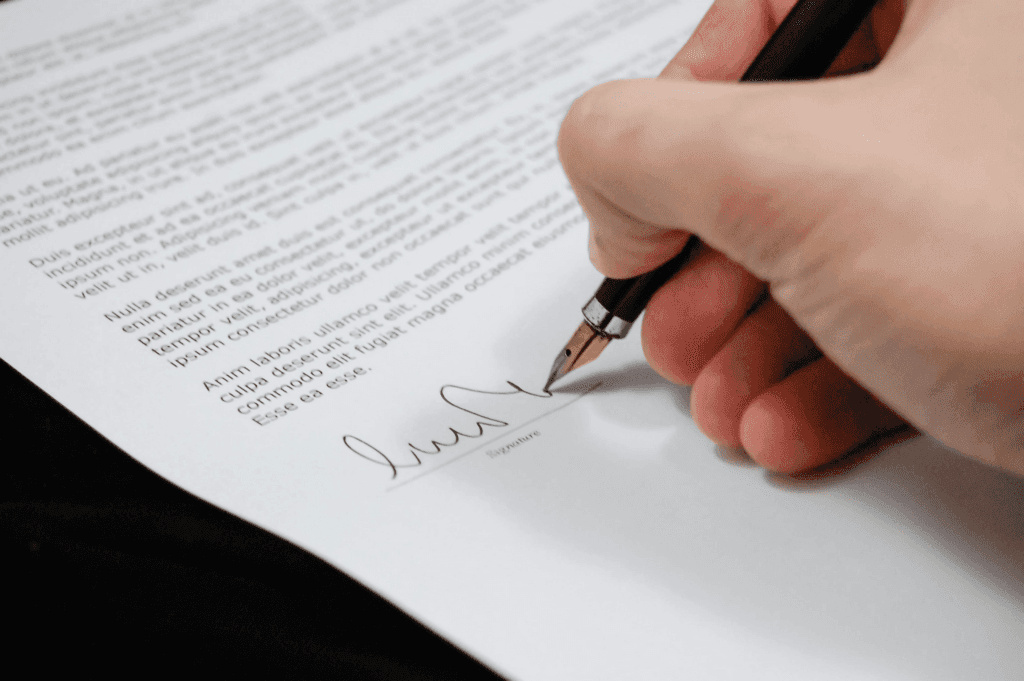 Signing a legal document.