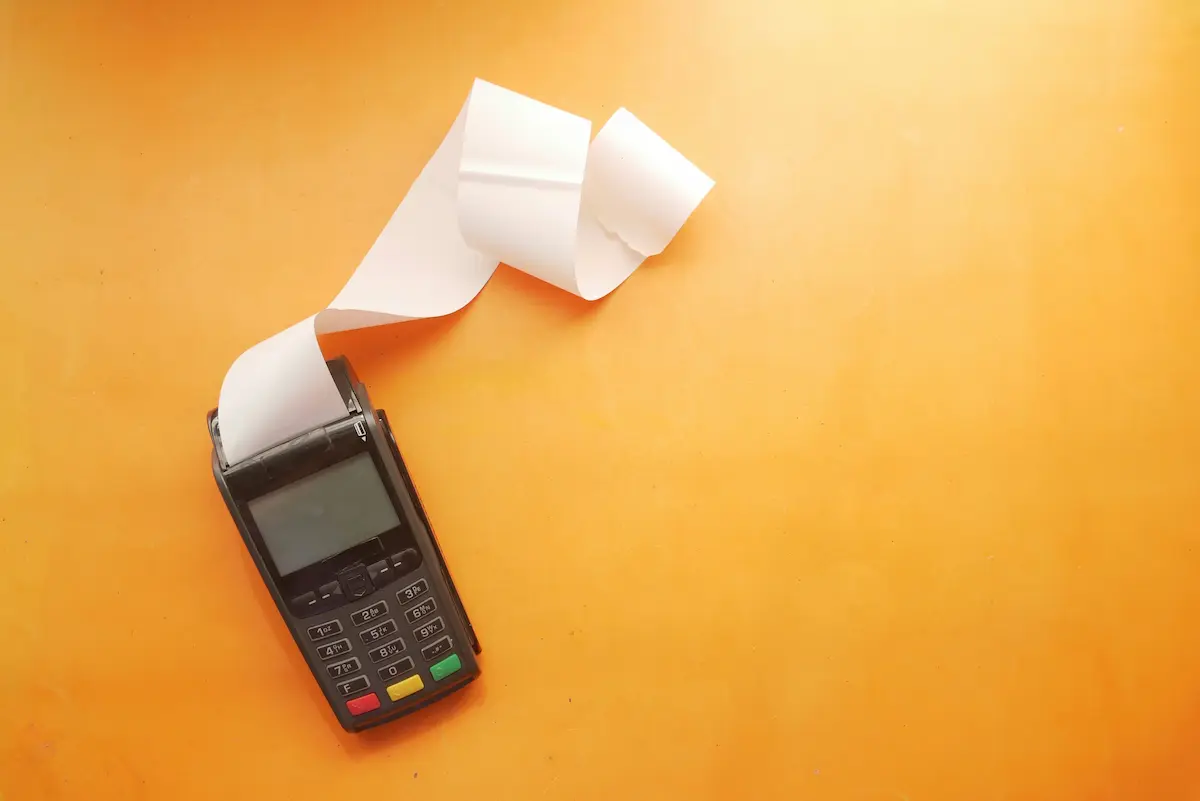 Receipt printing from a payment terminal, representing costs outside attorney fees