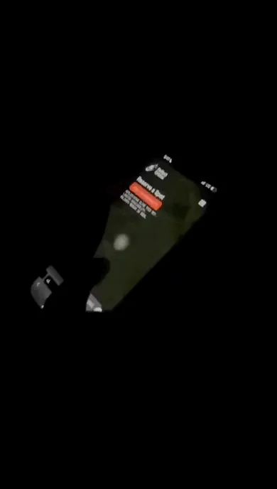 Close-up of a smartphone glowing in the dark as someone uses an app, symbolizing digital legal tools
